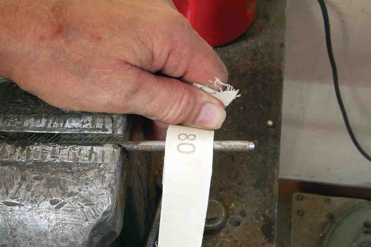 A steel rod should be roughed up with a coarse abrasive before it is epoxied into the stock.